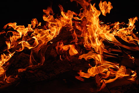 burning wood near black surface, fire, shutter speed, flames HD wallpaper