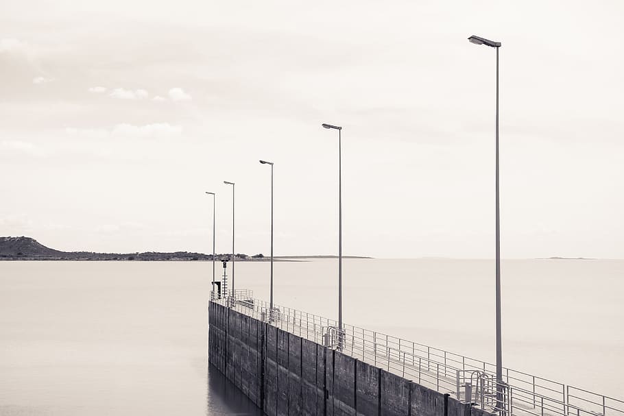 gray concrete dock with black light post, pier, quay, ocean HD wallpaper