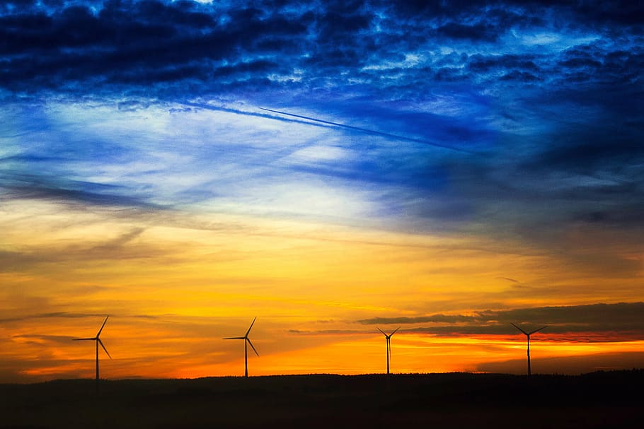 landscape photography of blue and yellow clouds in front of four windmills HD wallpaper