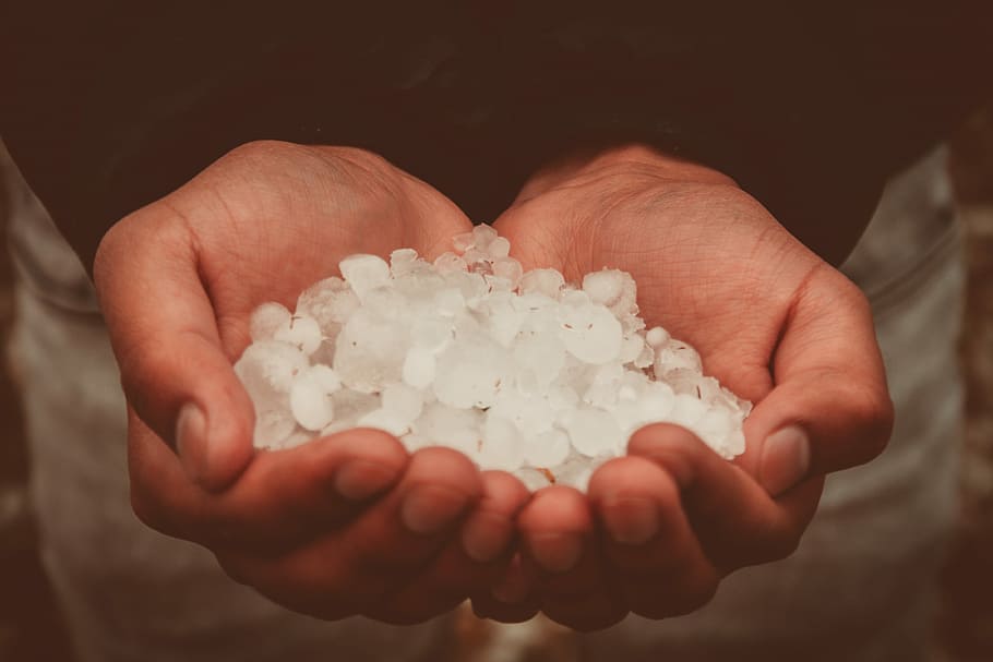 Hands of Ice, person holding white beads, hailstone, snow, human hand HD wallpaper