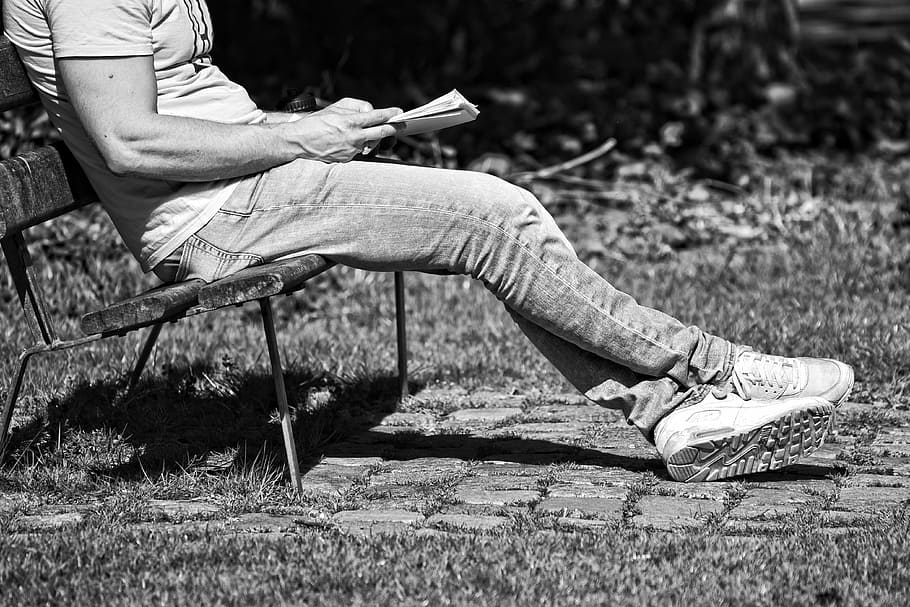 grayscale photography of person sitting on bench, man, reading HD wallpaper