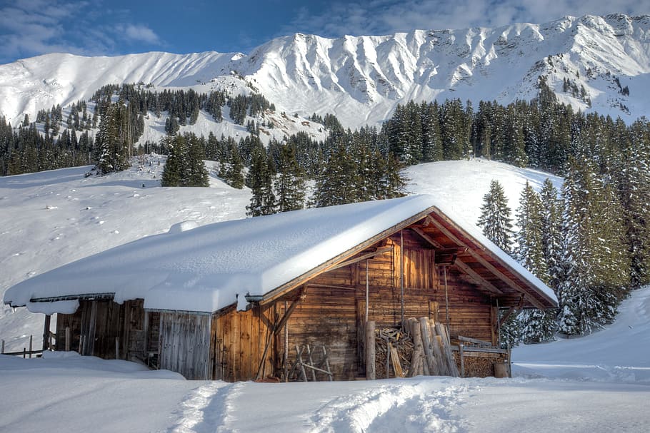 landscape photography of house near mountain filled with snow HD wallpaper