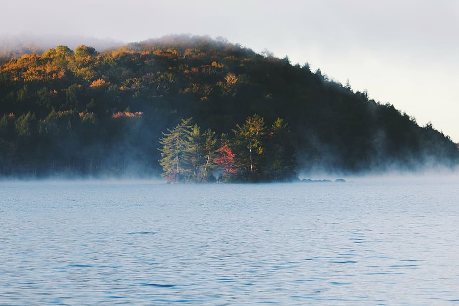 landscape photography of body of water beside mountain, floating HD wallpaper