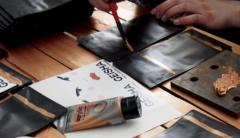 person painting on table, art, packaging, design, packaging design HD wallpaper
