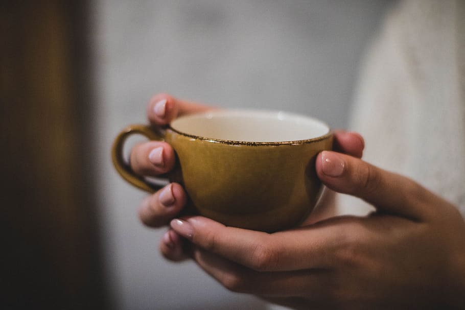 Person Holding Yellow Ceramic Cup, blurred background, breakfast HD wallpaper