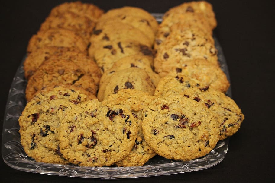 shallow focus photography of cookies in glass tray, tray of baked cookies with chocolate dips HD wallpaper