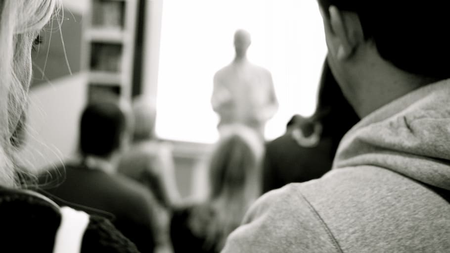 grayscale photography on man wearing hooded jacket, teaching HD wallpaper