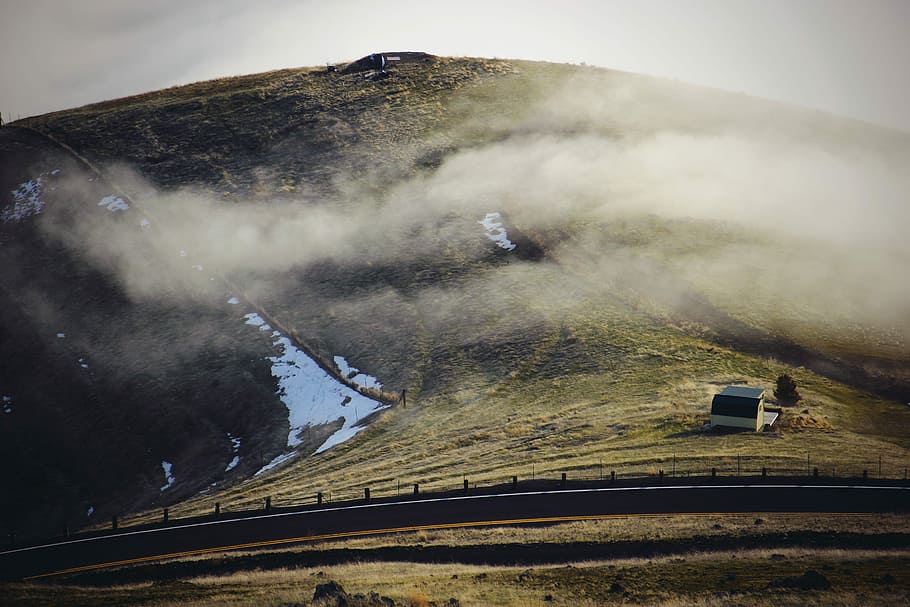 green and brown mountain under white clouds during daytime, green and black mountain near concrete road HD wallpaper