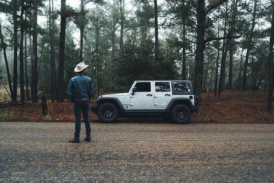 Hd Wallpaper Man Standing Near White And Black Car Man Standing Near White Jeep Wrangler Wallpaper Flare