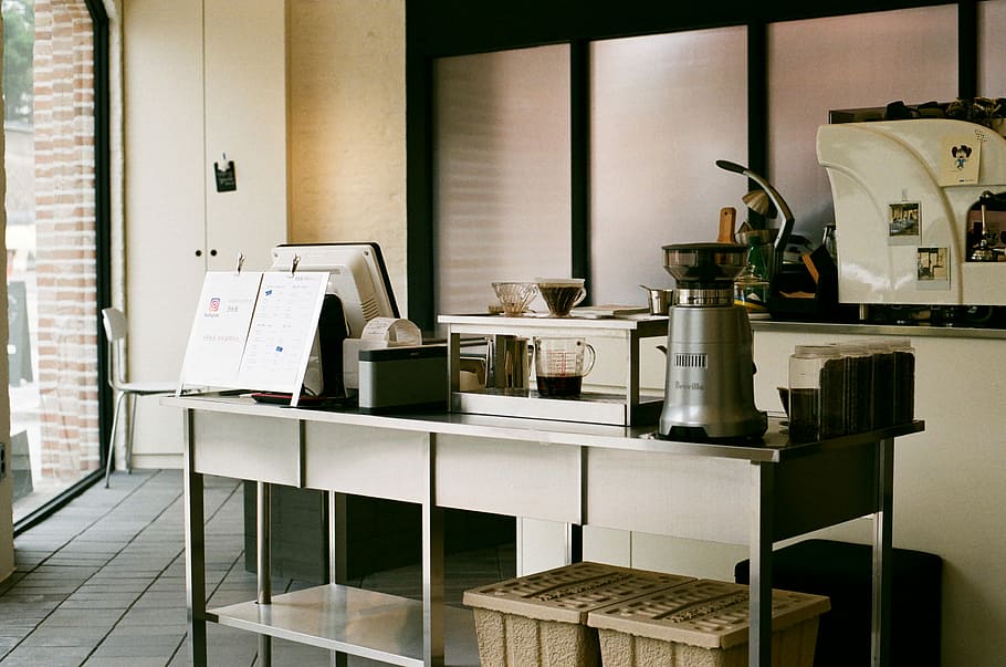 stainless steel table with coffeemaker, white wooden desk, cafe HD wallpaper