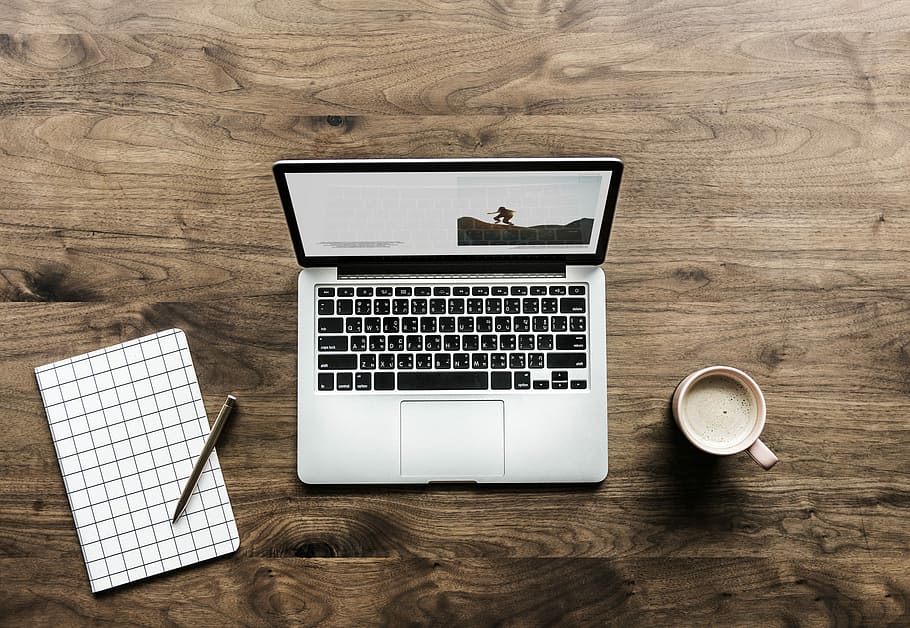 flat lay photography of laptop beside coffee mug, workspace HD wallpaper