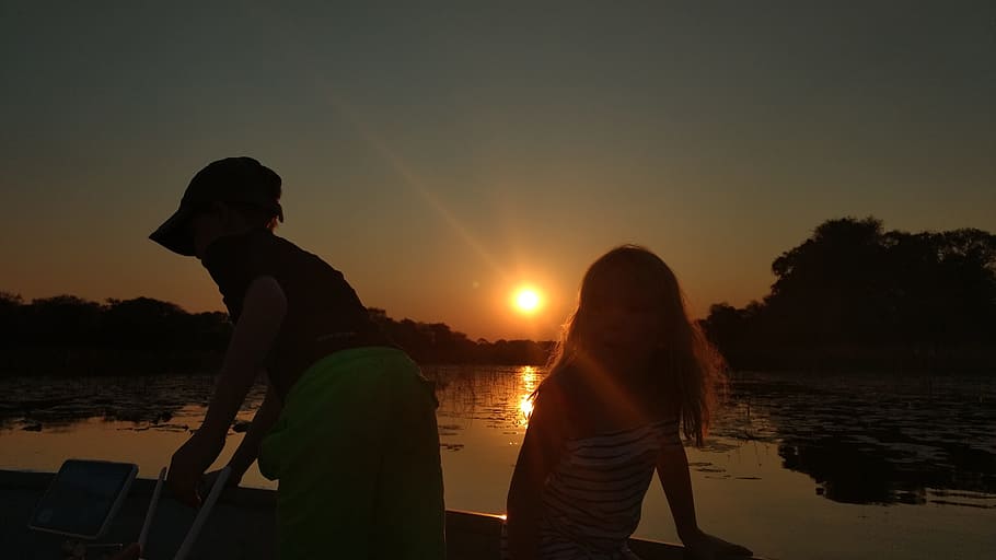 sunset, dawn, backlit, people, evening, dusk, water, botswana HD wallpaper