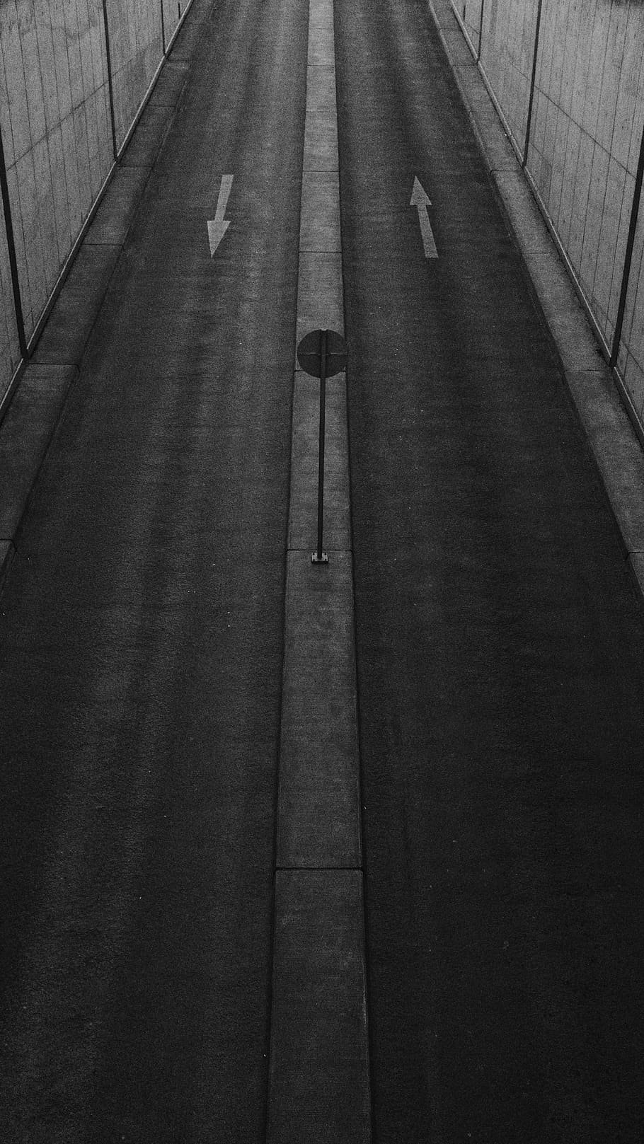 aerial photography of concrete road, grayscale photography of signage in between asphalt road HD wallpaper