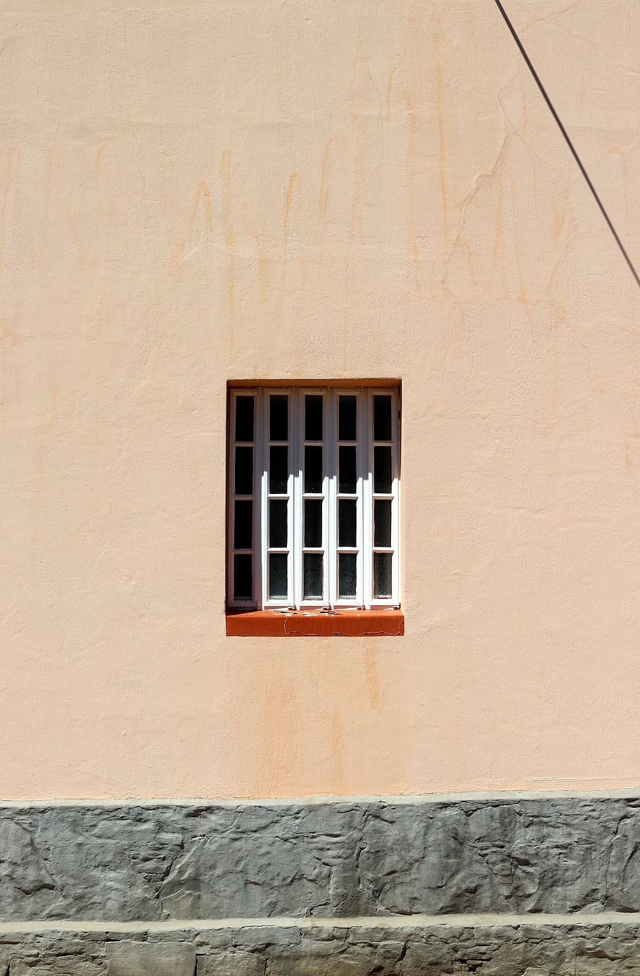 wall with window during daytime, clear glass panel window on brown concrete wall HD wallpaper