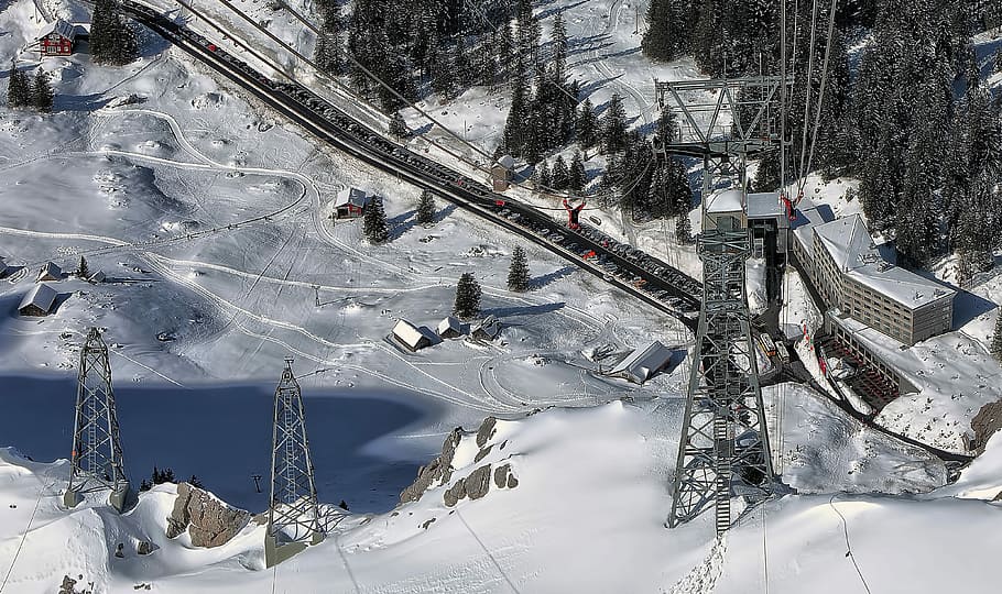 aerial photo of snow terrain near railway during daytime, aerial view photography of cable towers, HD wallpaper