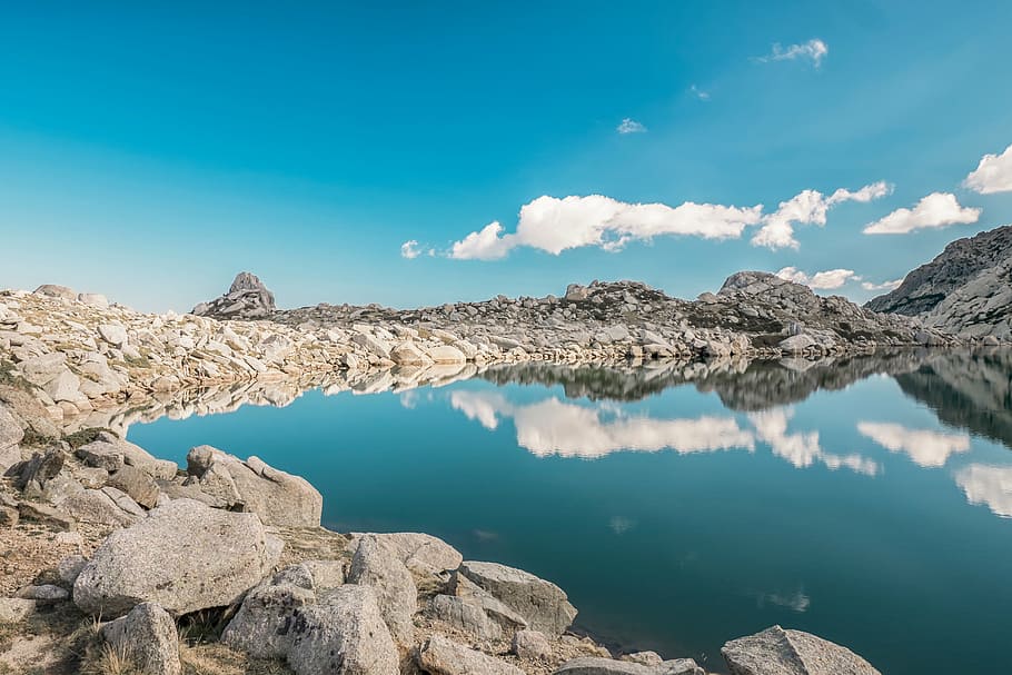 rocks near body of water at daytime, lake, blue, reflection HD wallpaper