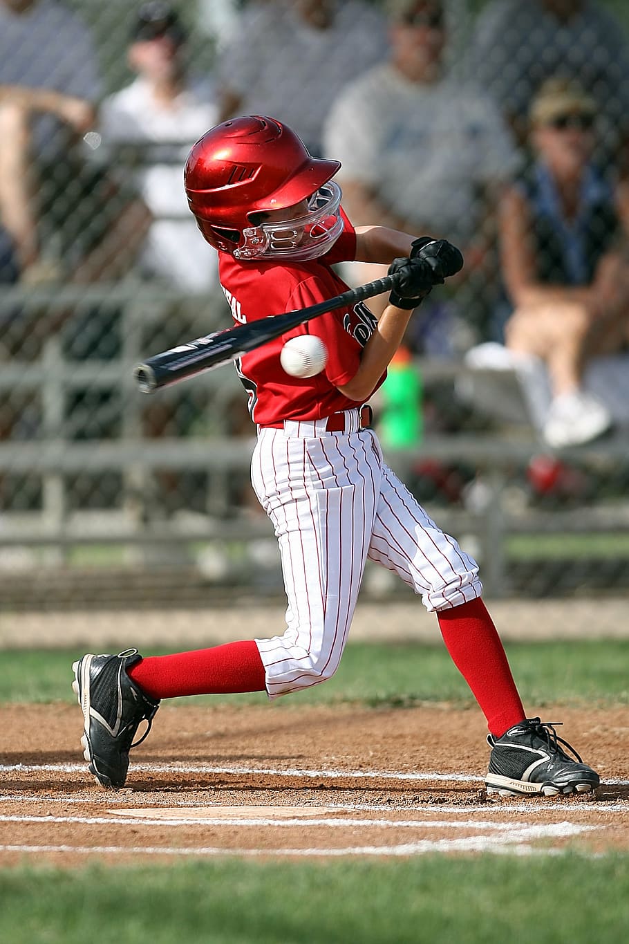 Little League Baseball Player At The Plate, Swinging The Baseball Bat From  Behind. Stock Photo, Picture and Royalty Free Image. Image 52153964.