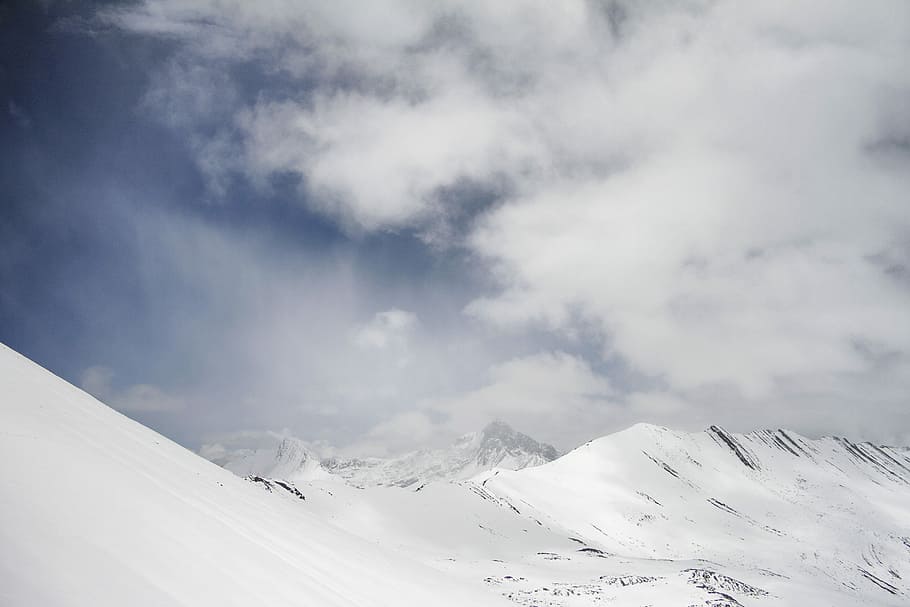 white sky, snow-covered mountains under cloudy sky, clouds, blue sky HD wallpaper