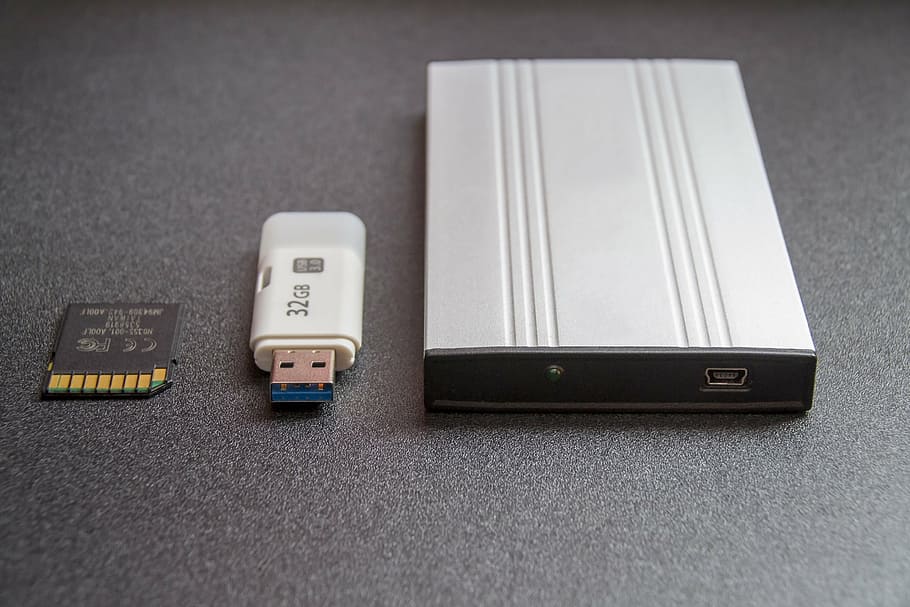 Hd Wallpaper Gray Power Amplifier Beside Flash Drive On Gray Surface White Wallpaper Flare