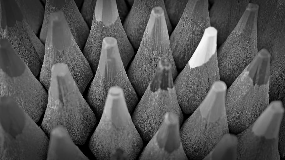 closeup photography of pencils, colored pencils, black white