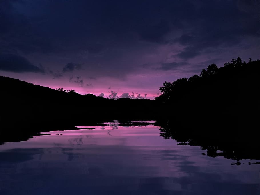 silhouette photography of lake, river near mountains during nighttime HD wallpaper
