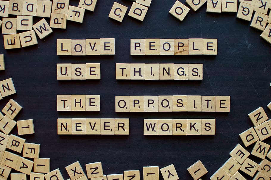 cube letters, brown wooden scrabble chips forming love people use things the opposite never and works letters, HD wallpaper