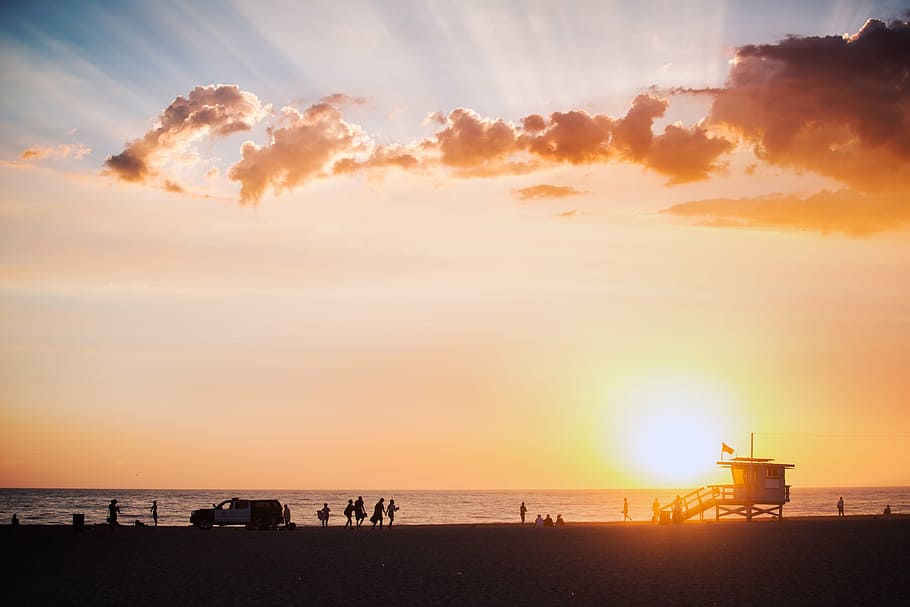 beach, clouds, lifeguard, ocean, oceanshore, people, sky, sunset HD wallpaper