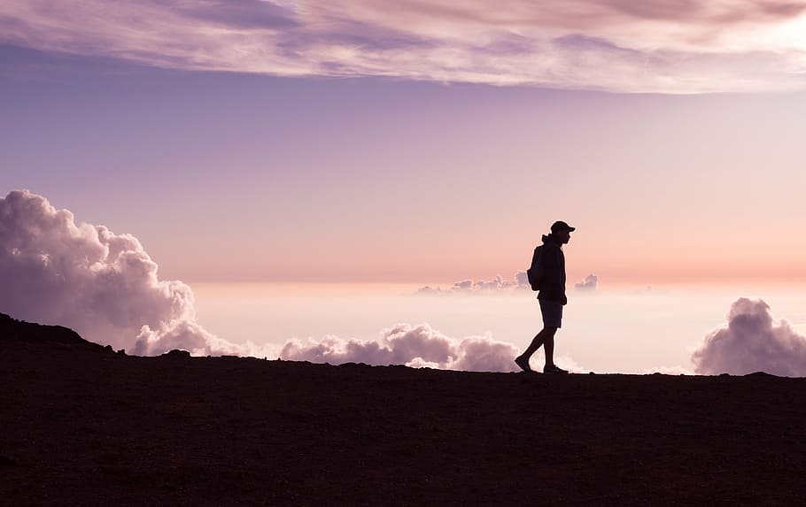 silhouette of person walking, mountain, highland, clouds, sky HD wallpaper