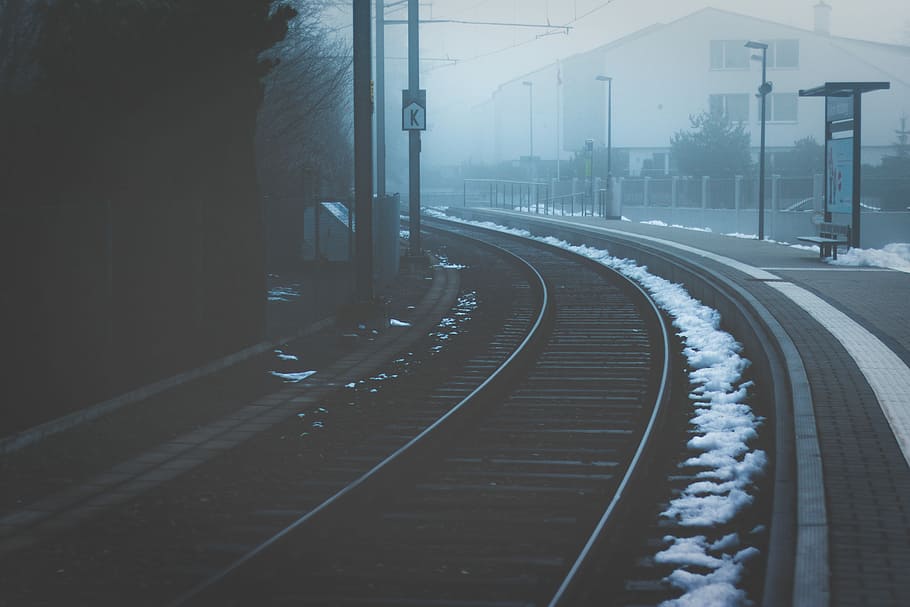 black railroad near buildings, free train rail, train track, mist HD wallpaper