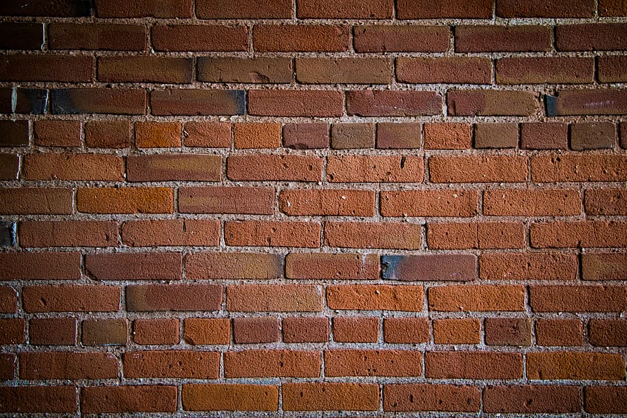 brown concrete bricked wall, closeup photo of brown brick wall HD wallpaper