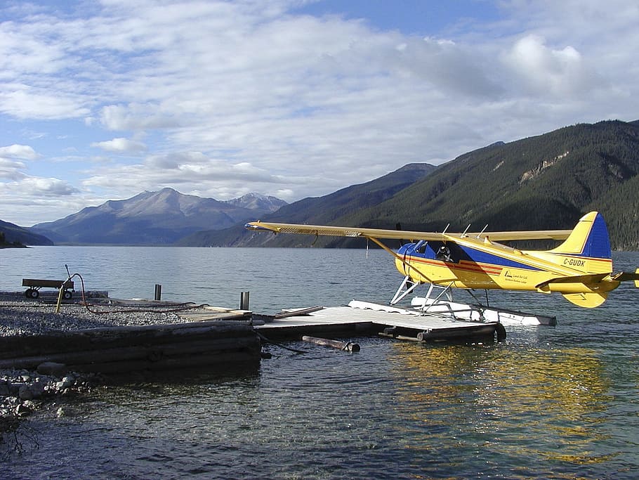 yellow and blue boat on body of water, Yukon Territory, Float Plane