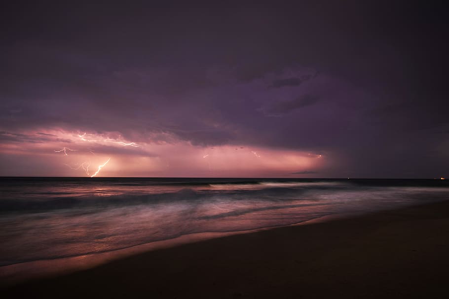 lightning on ocean, seashore photo during thunder storm, sunset HD wallpaper
