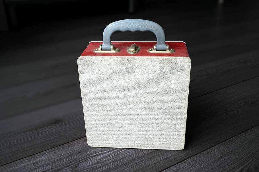 depth photography of brown and red lunch box, vintage portable vinyl record box, HD wallpaper