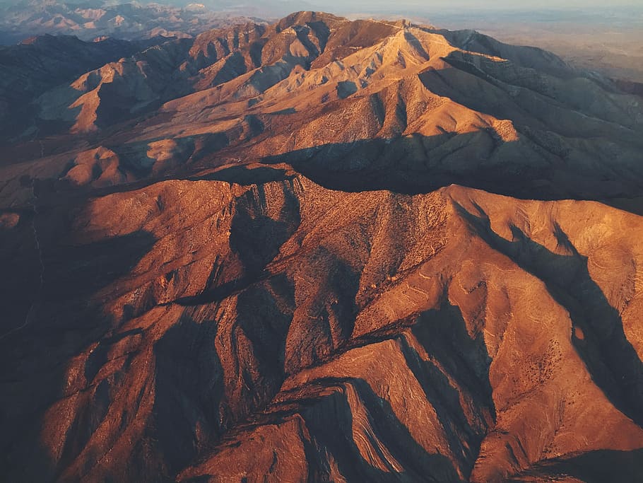 aerial view of brown mountains, aerial view photography of rock mountains HD wallpaper