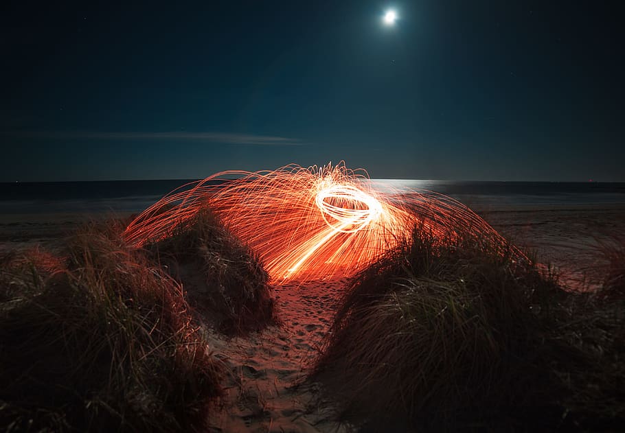orange steelwool during night, untitled, long exposure photography HD wallpaper