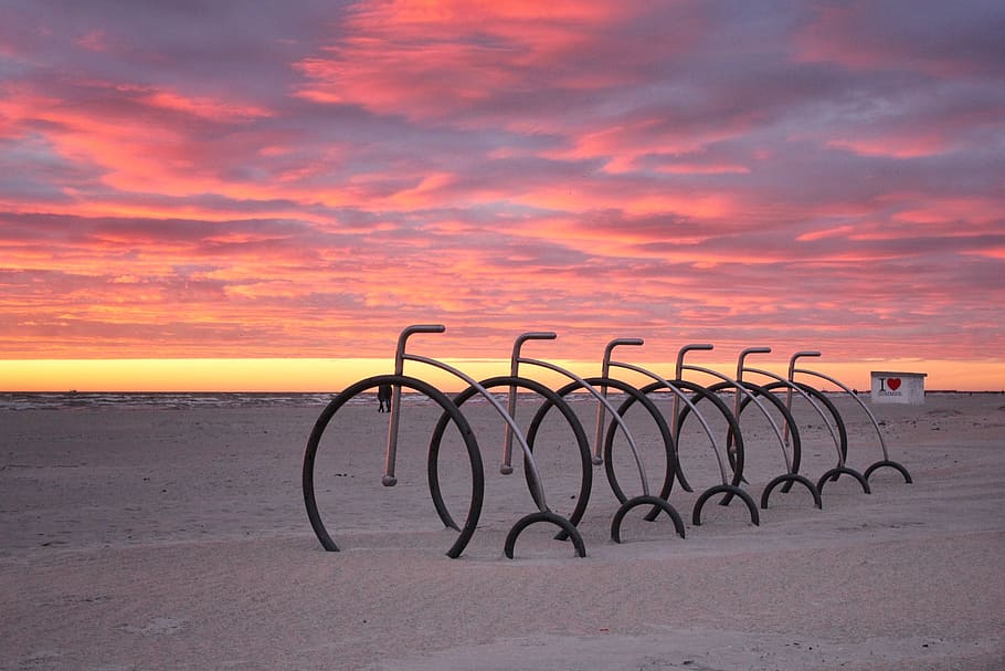 nature, beach, sunset, clouds, bicycles, sand, sky, sea, land HD wallpaper