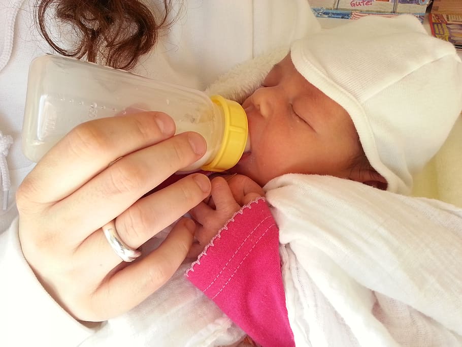 person carrying baby with white beanie, bottle, suck, feed HD wallpaper