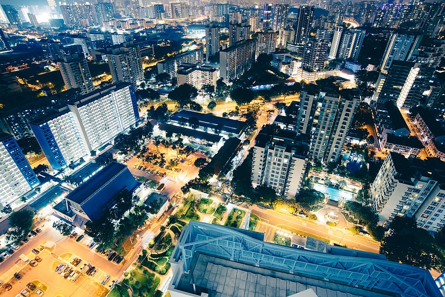 aerial photo of city buildings lights during night time, top view of city buildings HD wallpaper