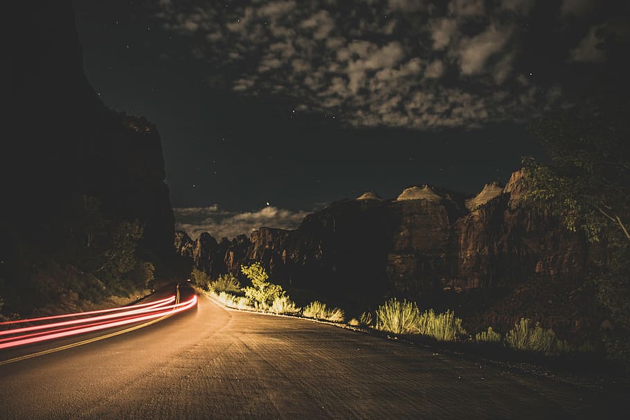 time-lapse photography of road surrounded by hills, black, asphalt HD wallpaper