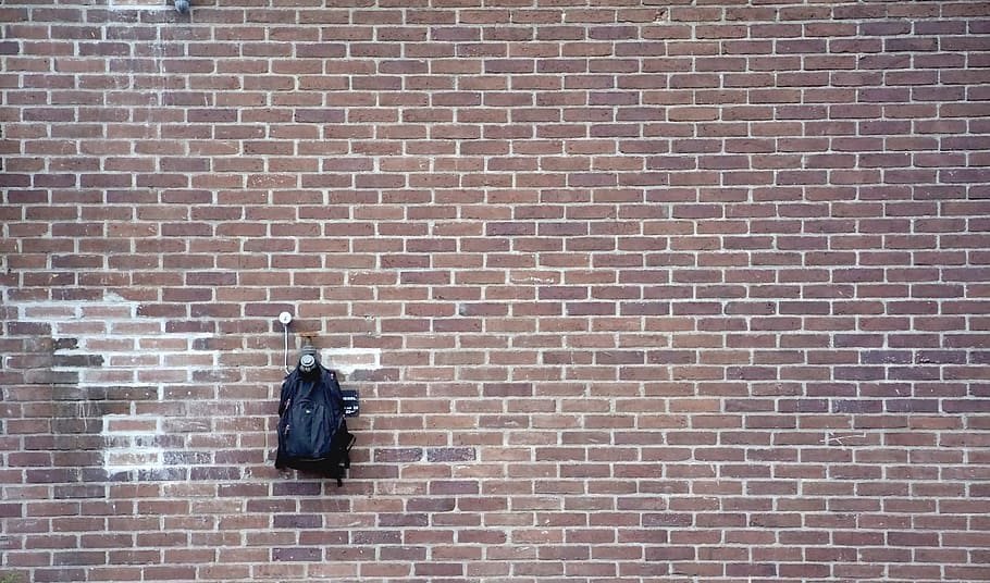Missed 1 of 8, black backpack in brown wall, brick, brickwork HD wallpaper