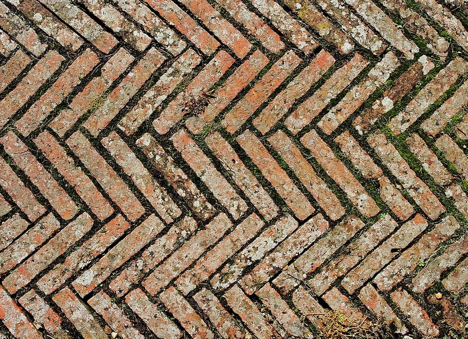 brown bricks forming chevron pattern close-up photography, Diagonal