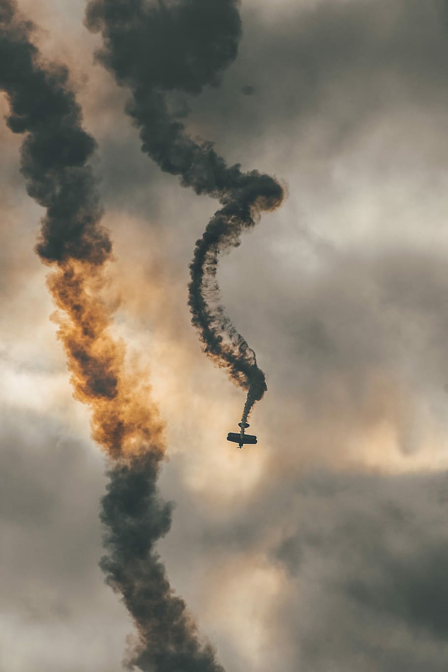 Sky Trails, smoke emitting biplane, stunt, crash, cloud, dark HD wallpaper