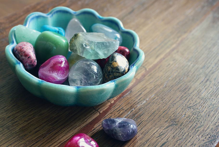 assorted-color rock collection on and beside teal ceramic bowl, HD wallpaper