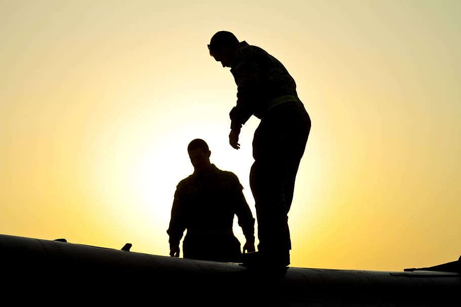 silhouette of person on roof, sunset, silhouettes, military, air force