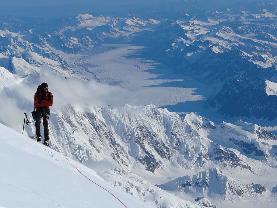 person standing on snowy mountain during day time, mountain climber HD wallpaper