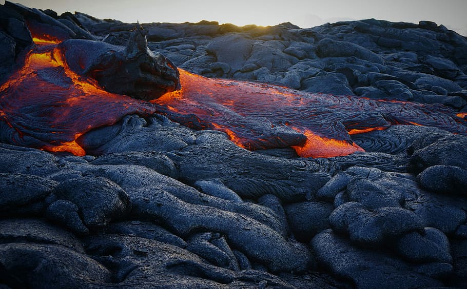 gray rock formation, lava coming out from volcano, hot, nature