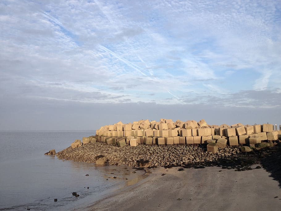 breakwater, dike, wall, stones, north sea, stone blocks, sky HD wallpaper