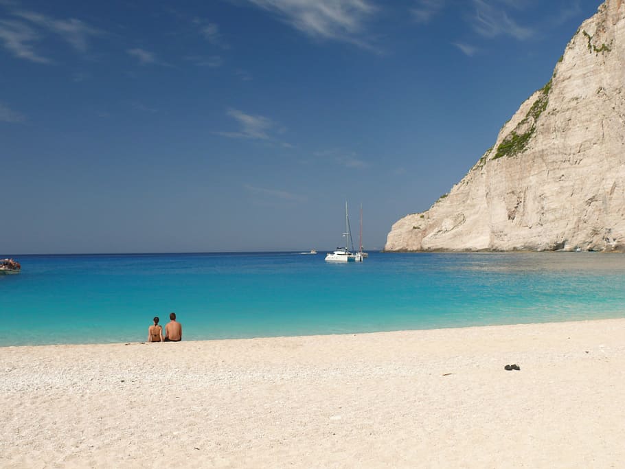 man and woman sitting on beach, Greece, Sea, Beach, Ocean, zakhintos, HD wallpaper