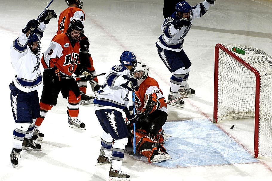 two teams playing ice hockey, goalie, sport, helmet, game, sticks