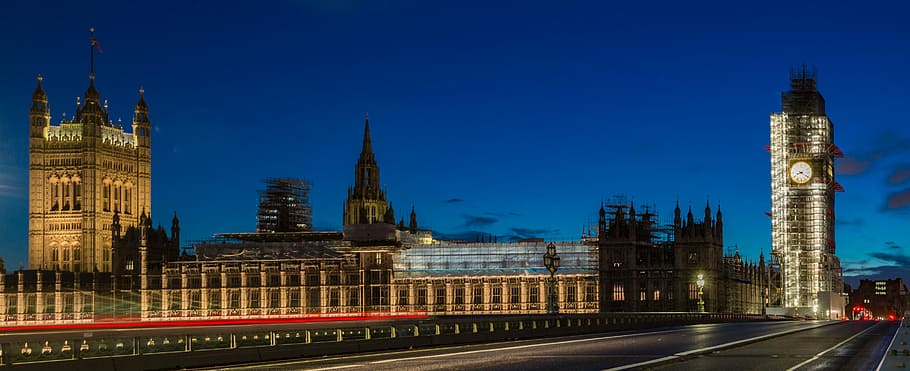 brown concrete building near tower at nighttime, brown castle HD wallpaper